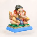 Close up detailed view of 12 inch Baal Ganesh eco-friendly clay idol with Mushak in pink dhooti