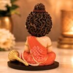 Back view of Balveer Hanuman Ji clay idol showing detailed hair and crown craftsmanship