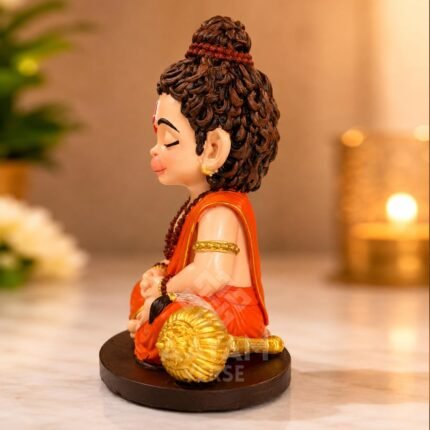 Side angle view of Balveer Hanuman Ji idol showing hand-painted ornaments and sturdy base