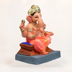 Side view of 12 inch Chaurang Orange KP eco-friendly clay Ganesh idol seated on throne for Ganesh Chaturthi home pooja