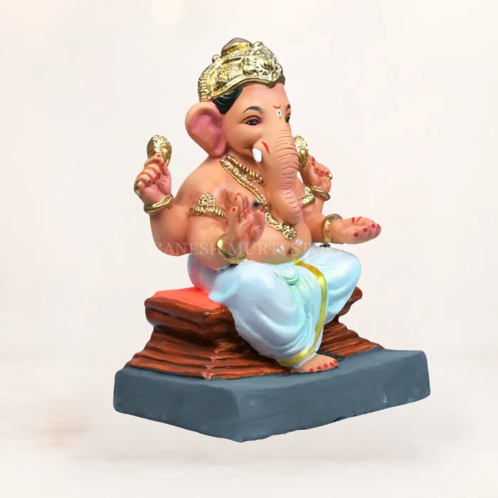 Side profile view showing back rest and ornament details of 12 inch Chaurang White KP eco-friendly clay Ganesh idol