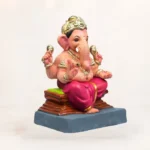 Side profile view of 12 inch Chaurang Red KP eco-friendly clay Ganesh idol for Ganesh Chaturthi pooja