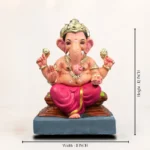 Size scale reference view of 12 inch Chaurang Red KP eco-friendly clay Ganesh idol with measuring ruler