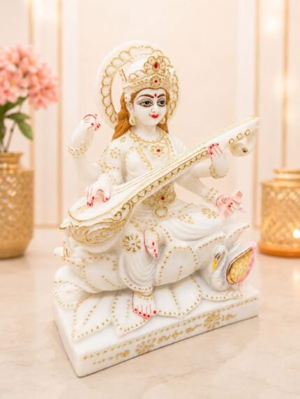 Side profile view of 12 Inch Composite Marble Goddess Saraswati Idol with gold detailing