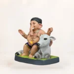Side view of 15 Inch Eco-Friendly Shadu Mati Cow Bal Ganpati Murti in Blue Dhoti