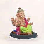 Side view of 14 inch eco friendly Shadu Mati Ganesh idol with lemon yellow dhoti