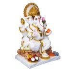 Side angle view of Seated Ganesh Marble Dust Idol in pink dhoti showing fine hand-painted details