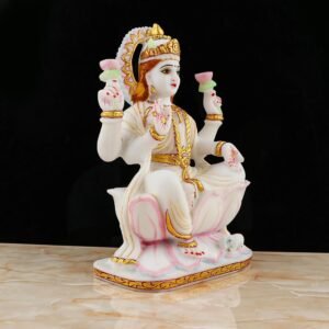 Side view showing intricate golden ornament details of Hindu Goddess Lakshmi Idol