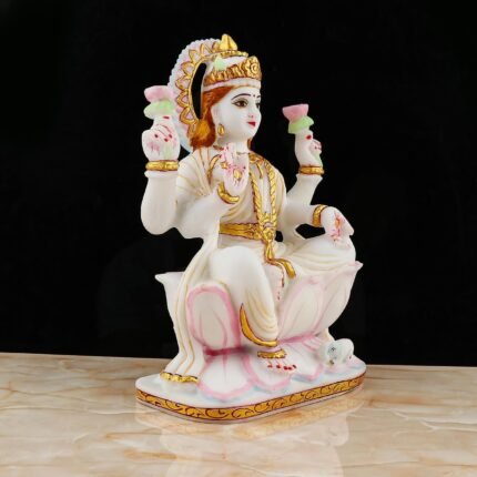 Side view showing intricate golden ornament details of Hindu Goddess Lakshmi Idol