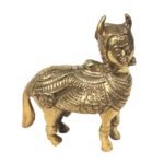 View the back angle of this exquisite Kaamdhenu Cow Metal Decor. This alternative photo highlights the clean, solid craftsmanship and detailed contours of the metal religious sculpture from every perspective