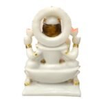 Front view of Marble Dust Lotus Lakshmi Idol seated on lotus base holding lotus flowers