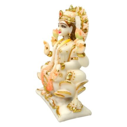 Side angle view of Marble Dust Lotus Lakshmi Idol showing detailed crown and jewelry