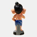 Back view of Rainbow Feathers Bal Ganesha handmade clay figurine showing detailed craftsmanship