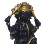 Close-up front view of Black Marble Dust Shanidev Idol showing gold crown and facial details