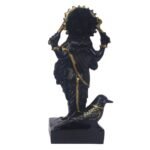 Back view of Black Marble Dust Shanidev Idol showing ornate golden halo arch and rear details