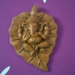 Terracotta Handpainted Ganesha on Leaf Wall Hanging Showpiece