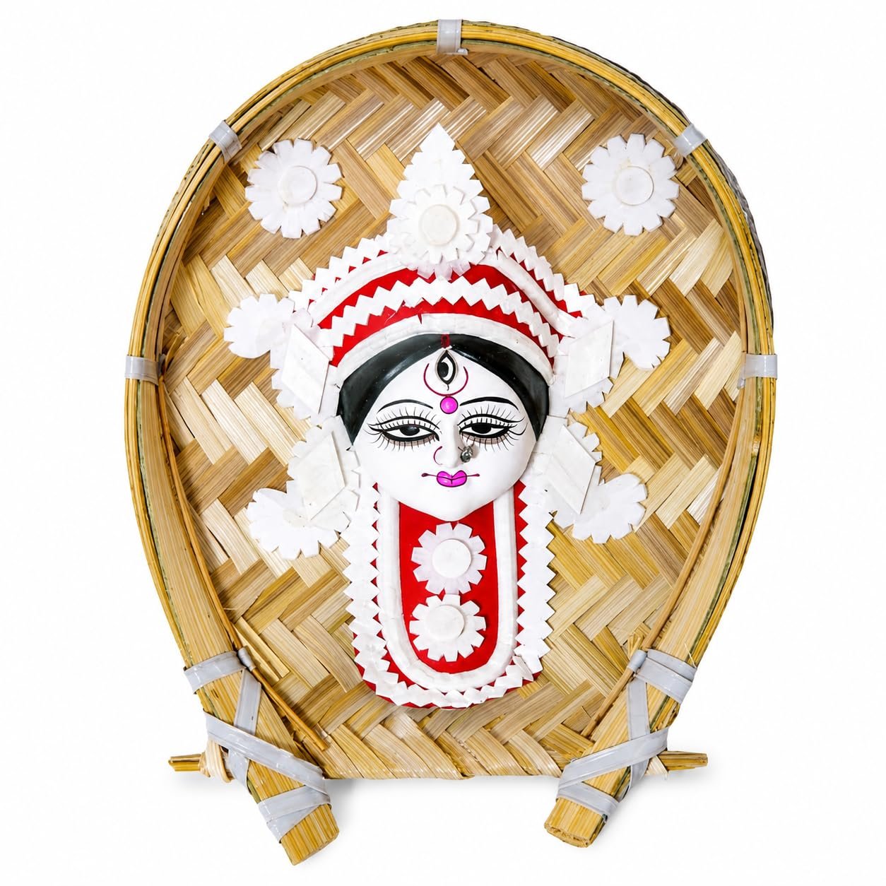 Traditional Bengali Sholapith Maa Durga Face on a Kulo (Bamboo Tray) Wall Hanging. Traditional Bengali Sholapith Maa Durga Face on a Kulo Bamboo Tray Wall Hanging