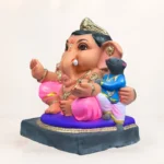 Side profile view of 14 inch eco friendly Shadu Mati Undir Gattu Ganpati murti with pink dhoti