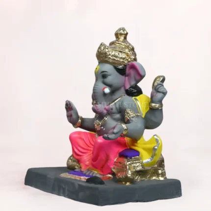 Side view of 14 inch eco friendly Shadu Mati Vithu Singhaasan Ganpati murti in pink dhoti