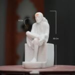 White Marble Sai Baba Idol in Samadhi Mandir style highlighting peaceful sitting posture and pedestal