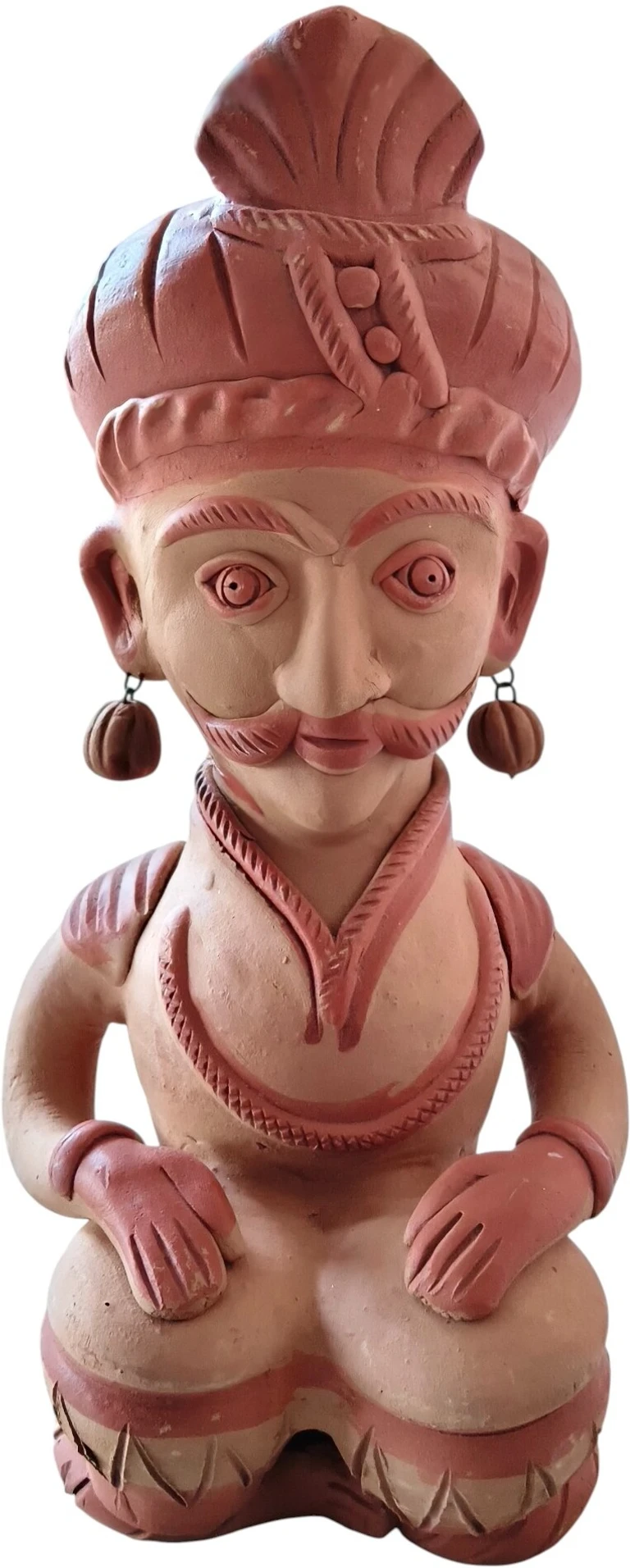 handcrafted Indian terracotta musician figurine Handcrafted Indian terracotta musician figurine showcasing traditional folk art for home decor