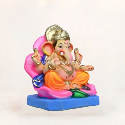 Eco-friendly 15-inch yellow dhoti Ganpati murti with jaswand flower motif for Ganesh Chaturthi decoration