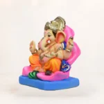 Eco-friendly 15-inch yellow dhoti Ganpati murti with jaswand flower motif for Ganesh Chaturthi decoration