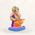 Eco-friendly 15-inch yellow dhoti Ganpati murti with kamal (lotus) motif for Ganesh Chaturthi decoration